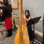 EY Funds Forum Harpist