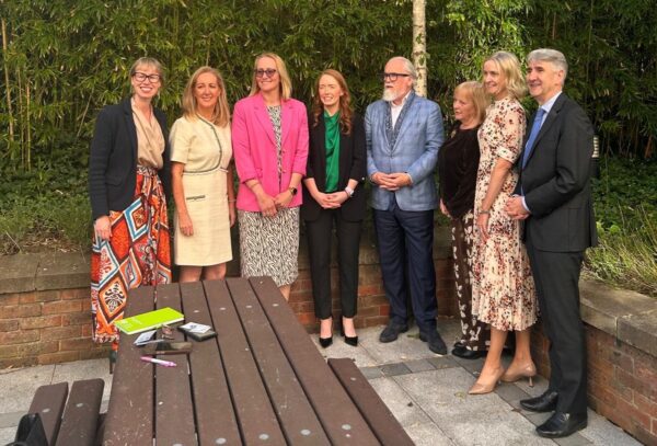 100 Women in Finance organising committee with panellists and Eoin FitzGerald