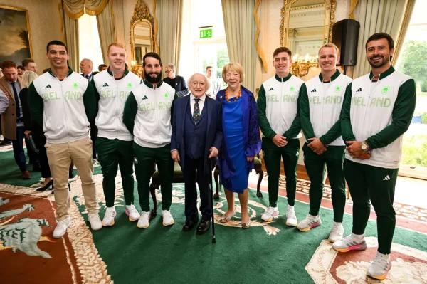 From left; Jordan Conroy, Gavin Mullin, Mark Roche, Sean Cribbin, Niall Comerford and Harry McNulty pose for a photograph with The President of Ireland Michael D Higgins and his wife Sabina Coyne during the Team Ireland homecoming at Áras an Uachtaráin in Dublin. Photo by David Fitzgerald/Sportsfile